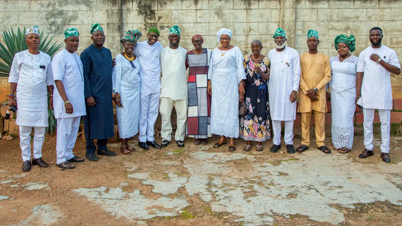 Ayobami with community elders and supporters